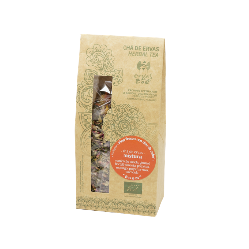 Colheita organic herbal tea blend in a kraft paper bag with a clear window showing dried herbs and flower petals.